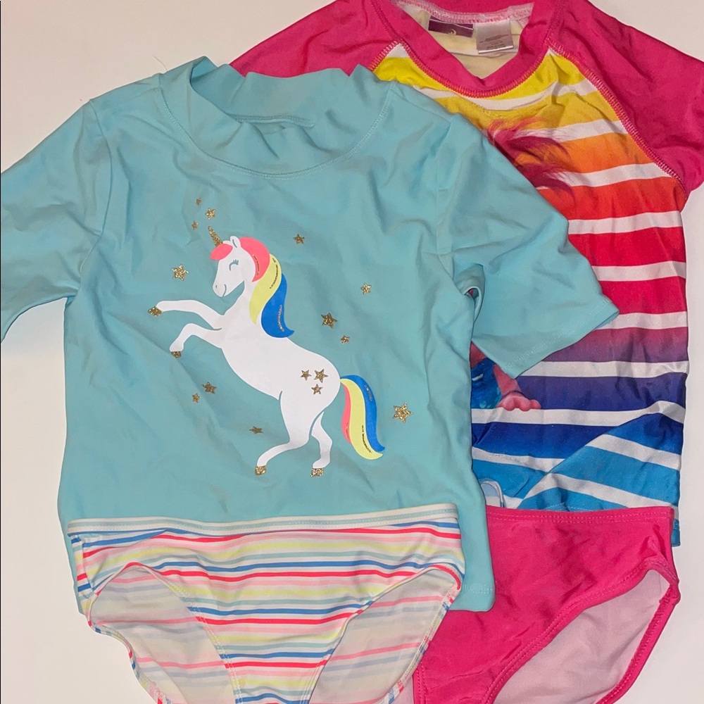 Pink/blue Swim set 4 piece short sleeve tops kids 7medium very good condition